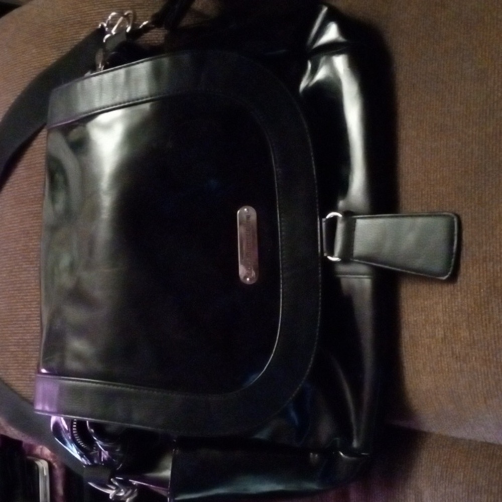 Black diaper bag with 3 pockets,2 side pockets,2 front pockets, change pockets